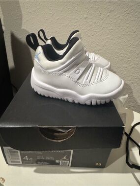 4C Jordan Toddler White Sneakers with Black Trim